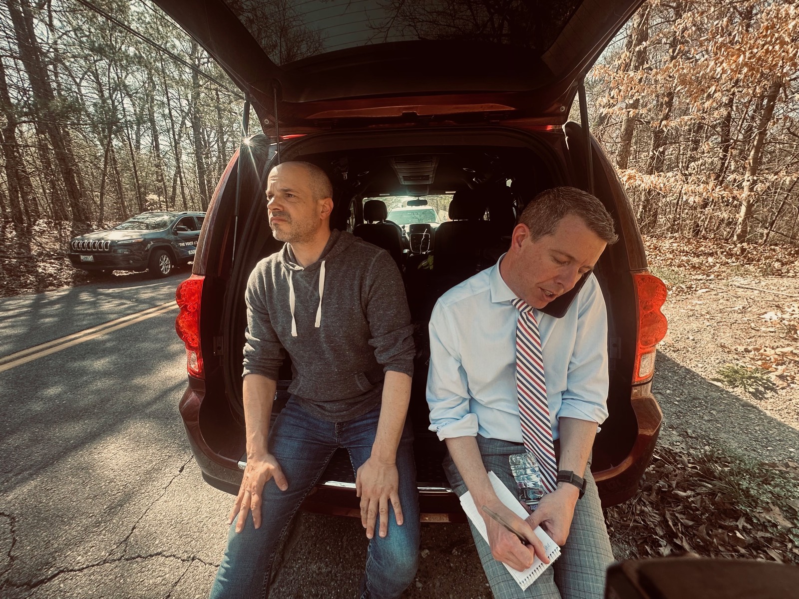 Tim White working on a story in the field