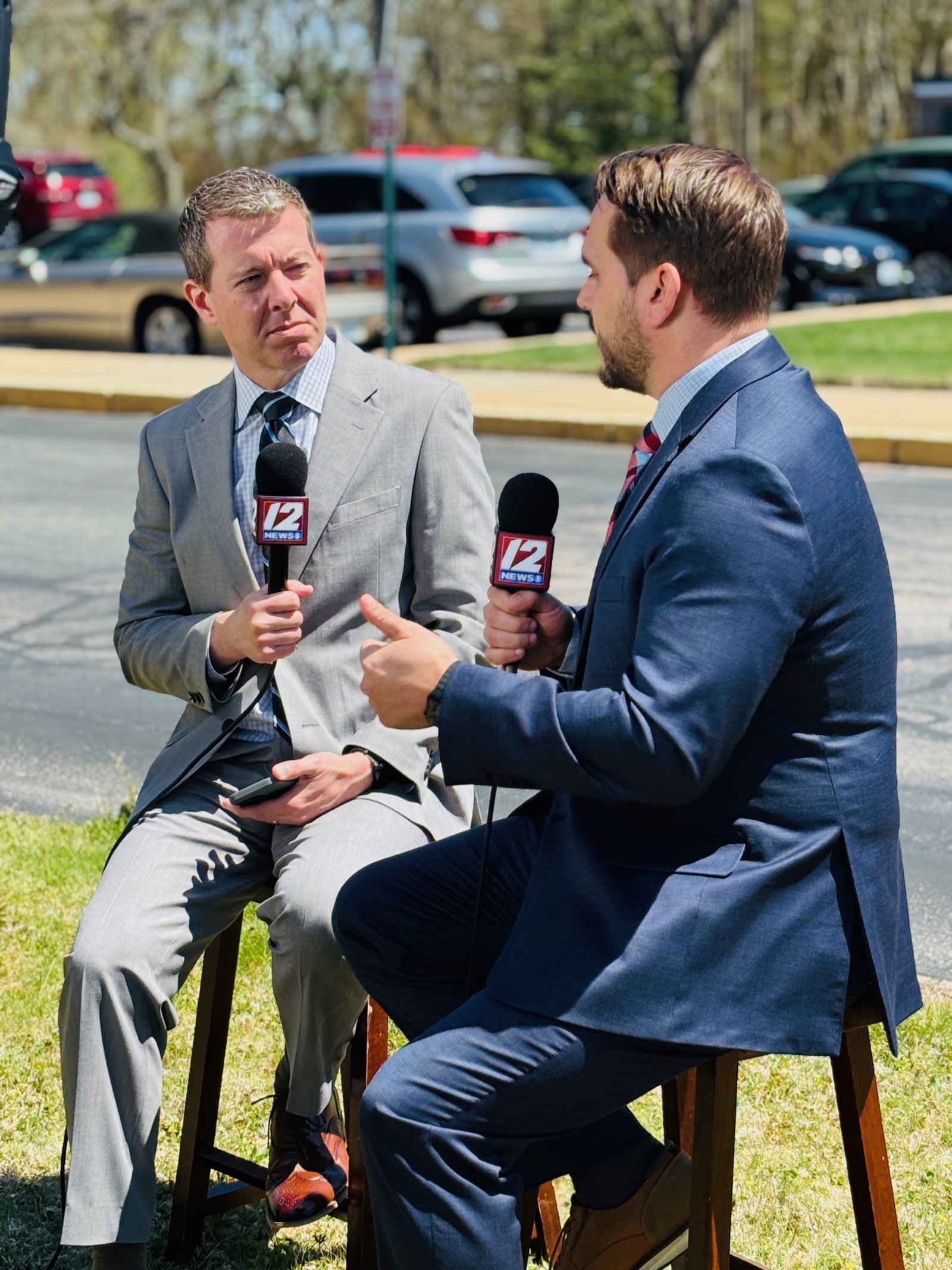 Tim White conducting an outdoor interview